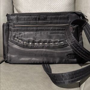 Lug Black Women’s Pacer crossbody purse. Approximately 10.5 x 8